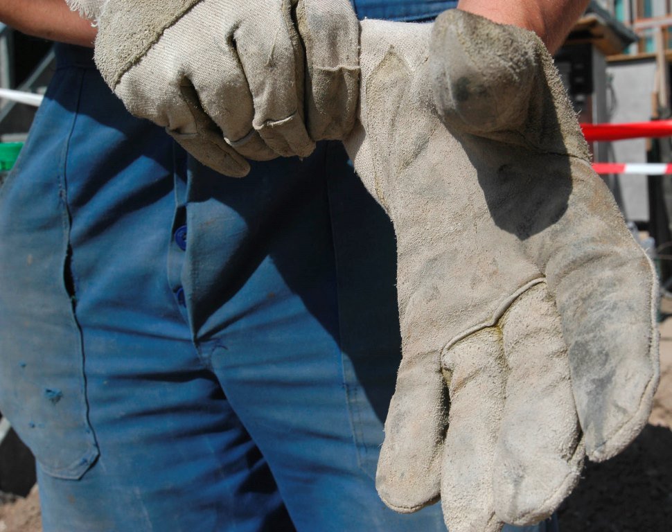 Handschuh Baustelle Handwerk Bauarbeiter Symbol Symbolbild bauen Blaumann Arbeitshose